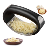 Stainless steel arc garlic press household kitchen garlic masher